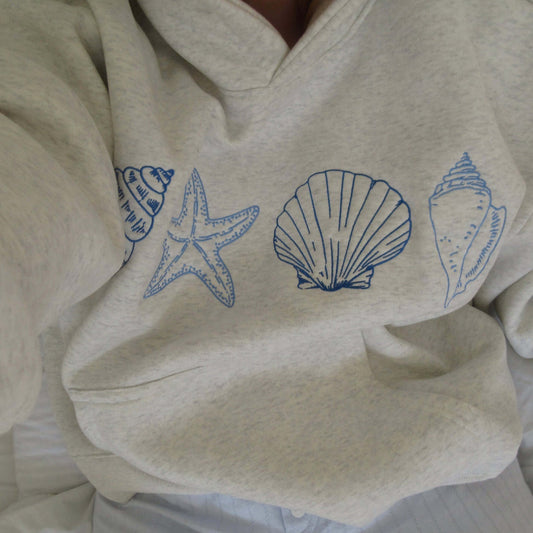 Sudadera con capucha para mujer con estampado de conchas marinas