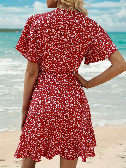 Leichtes Sommerkleid für Damen mit Blumenmuster und elegantem Wickeldesign