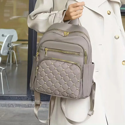 Sac à dos matelassé à l'avant
