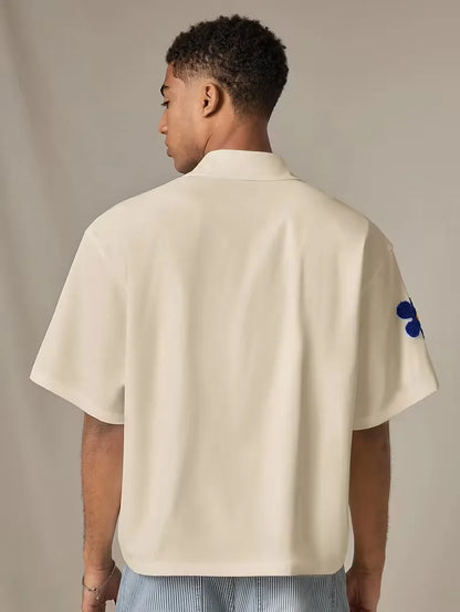 Chemise à manches courtes avec fleurs