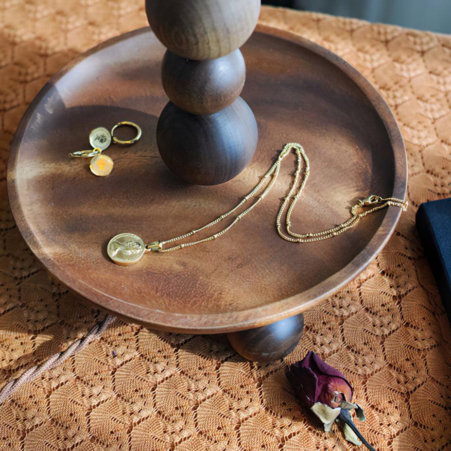 Lámpara de mesa moderna regulable de nogal y vidrio