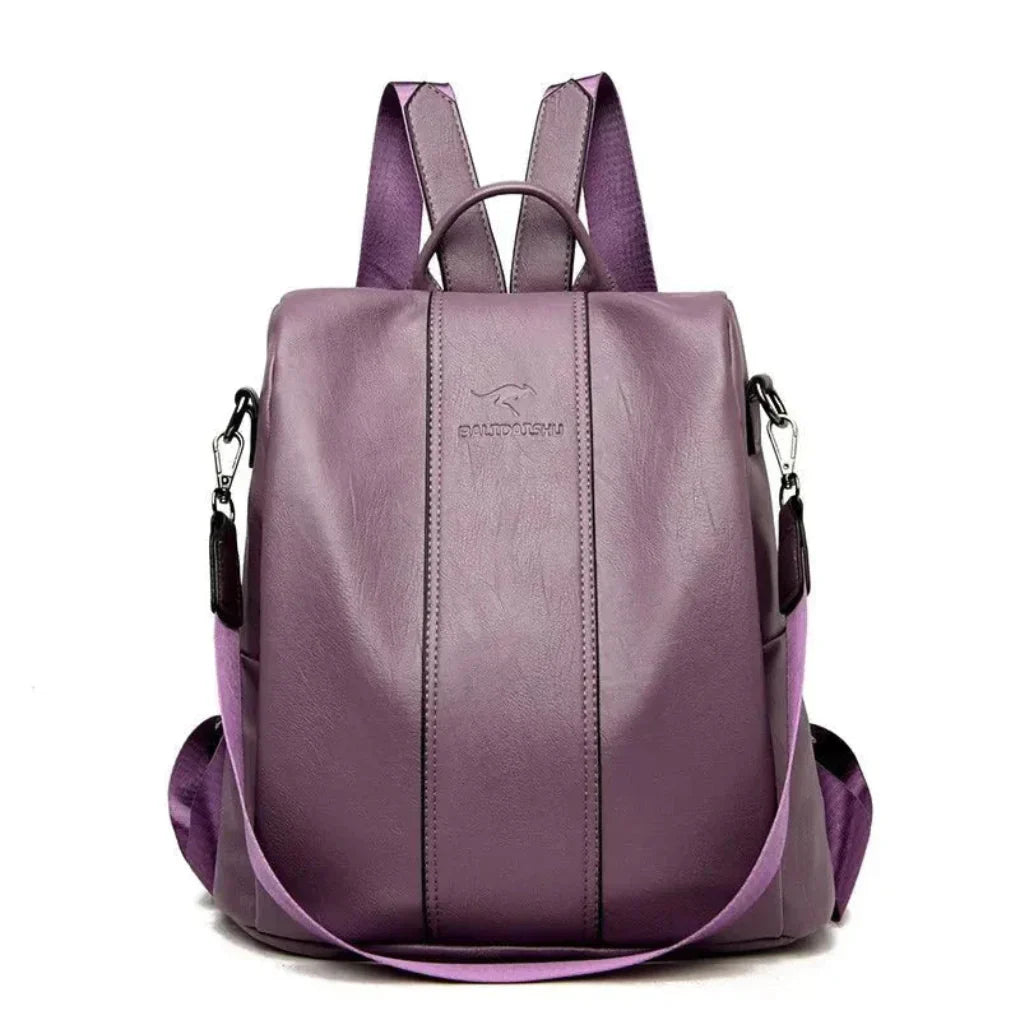 Anti-theft leather backpack for women, convertible design with hidden pockets for travel and everyday use