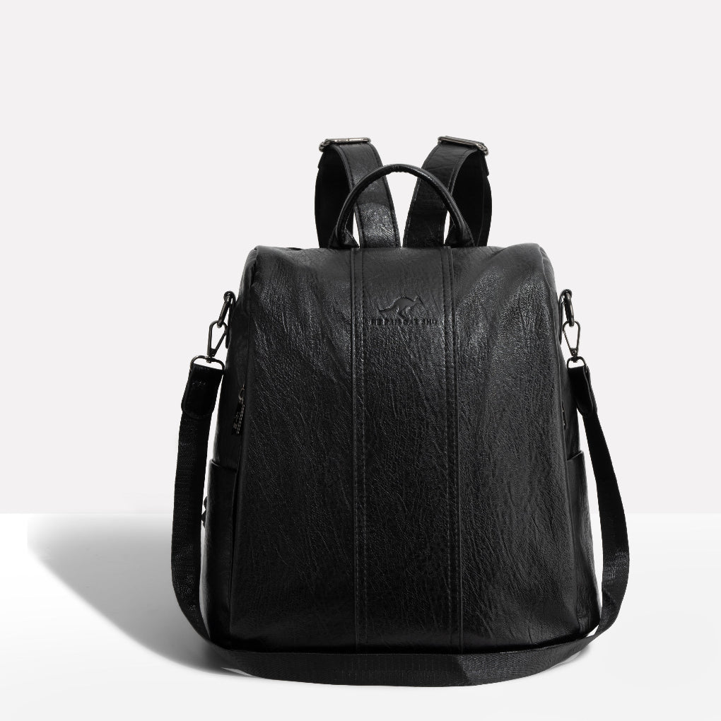 Anti-theft leather backpack for women, convertible design with hidden pockets for travel and everyday use