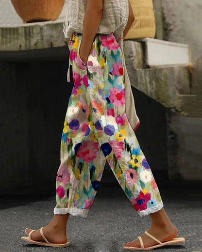 Carlijn | Colourful floral print trousers with pockets