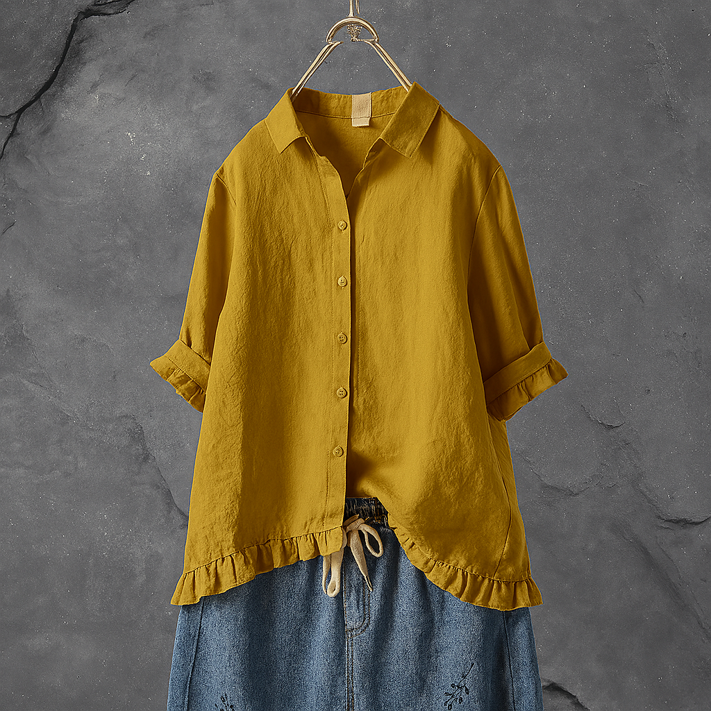 Cotton blouse with buttons and pleated hem