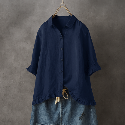 Cotton blouse with buttons and pleated hem