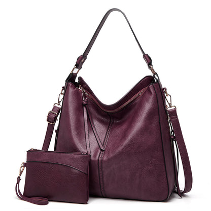 Classic Leather Shoulder Bag with Sleek Gold Details