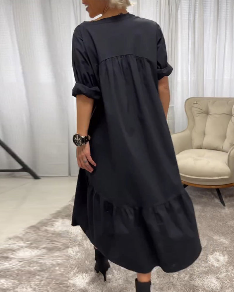 Dress with 3/4 Sleeves and Deep V-Neck