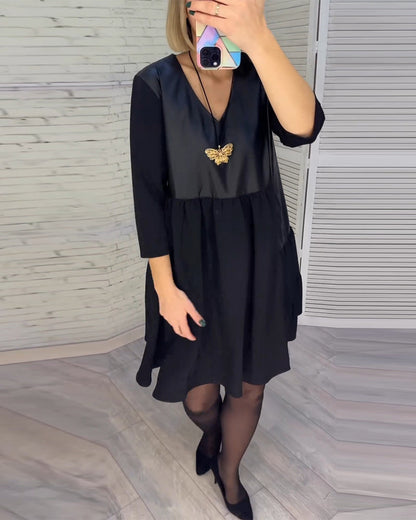 Dress with V-neck and patchwork