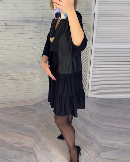 Dress with V-neck and patchwork