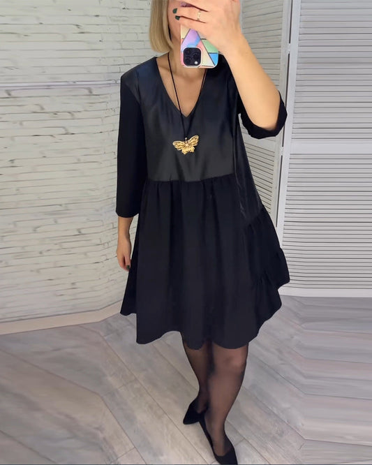 Dress with V-neck and patchwork
