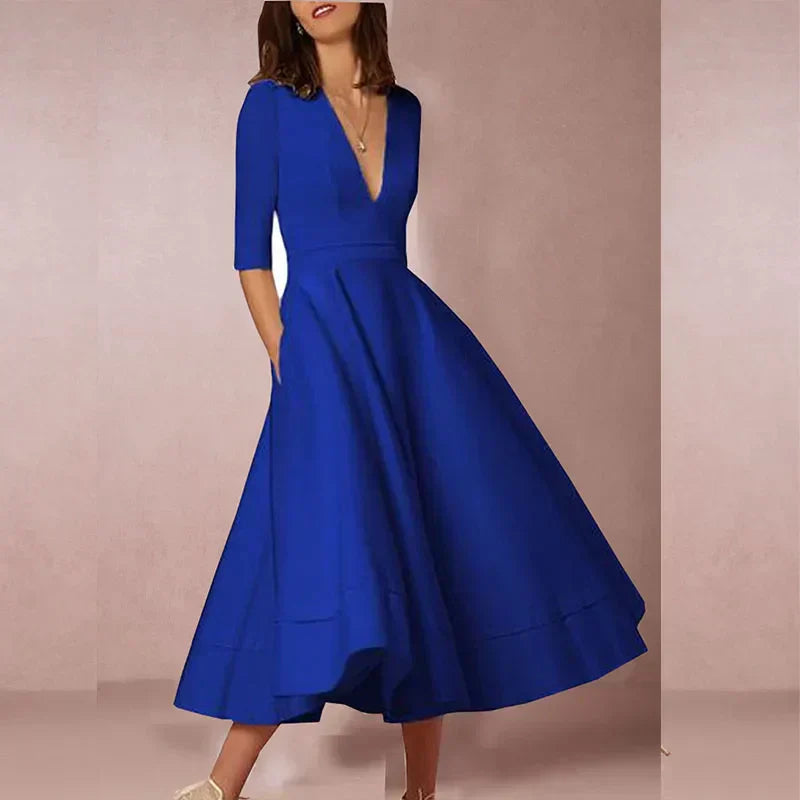 Elegant A-line Midi Dress with V-neck and Voluminous Skirt