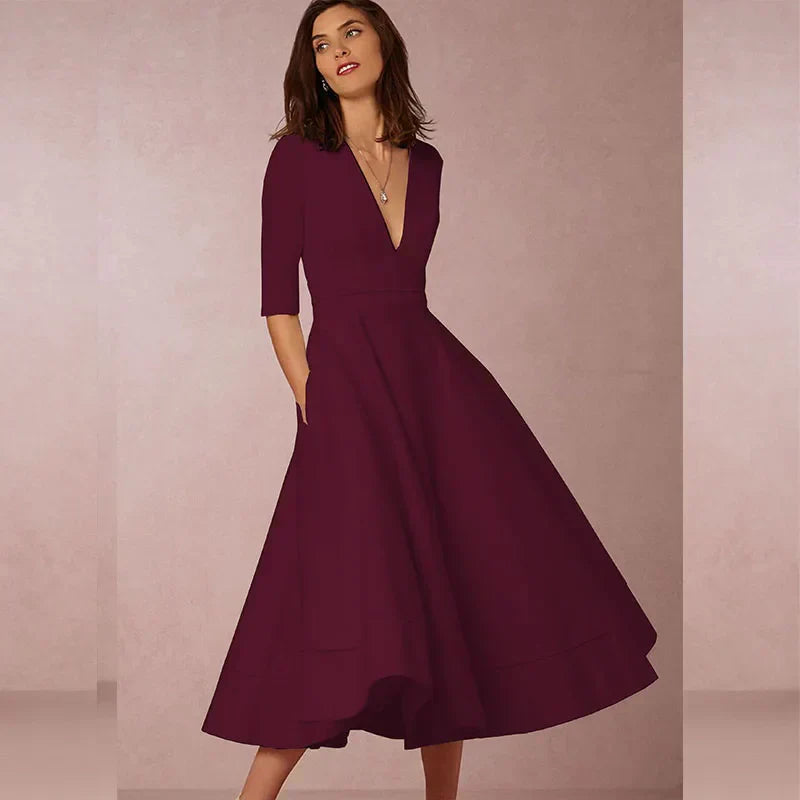 Elegant A-line Midi Dress with V-neck and Voluminous Skirt