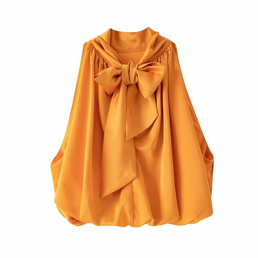 Elegant Orange Top with Subtle Shine and Feminine Fit