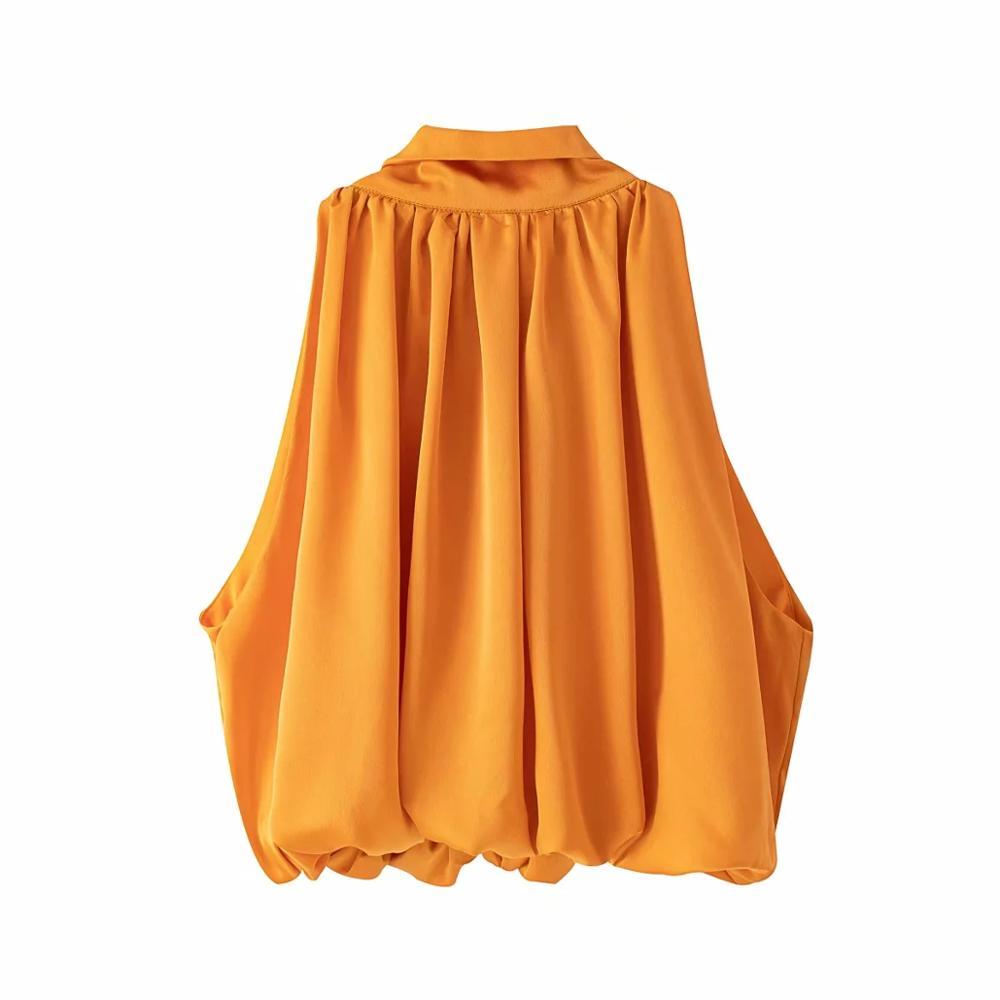 Elegant Orange Top with Subtle Shine and Feminine Fit