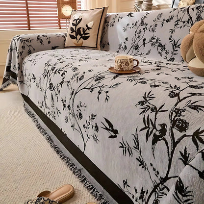 Elegant throw blanket with floral pattern and fringes