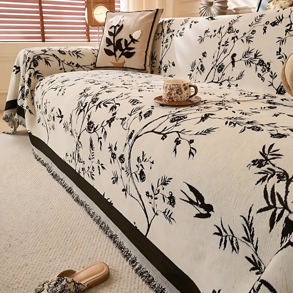 Elegant throw blanket with floral pattern and fringes