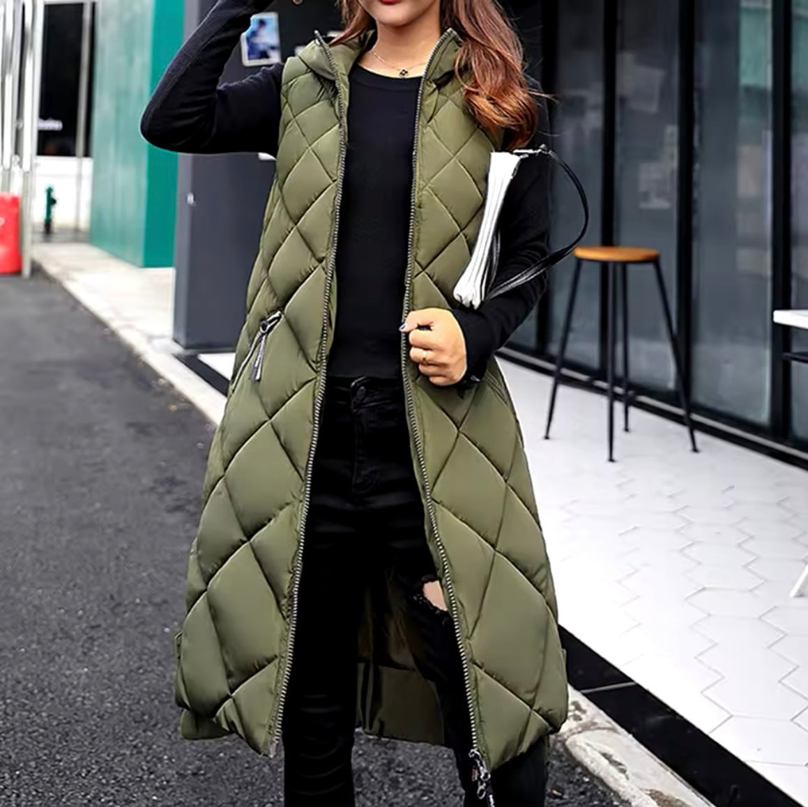 Padded sleeveless ladies' gilet with hood