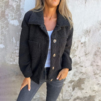 Fluffy coat with classic collar and patch pockets