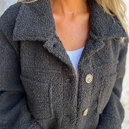 Fluffy coat with classic collar and patch pockets