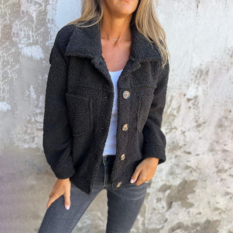 Fluffy coat with classic collar and patch pockets