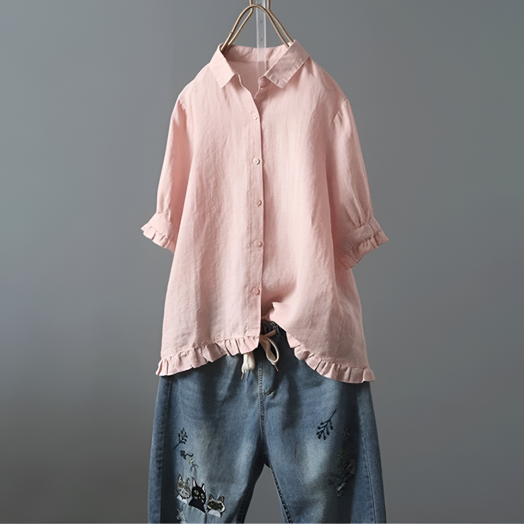 Cotton blouse with buttons and pleated hem