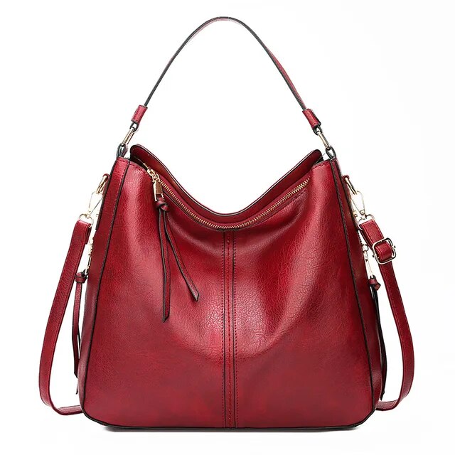 Classic leather shoulder bag with sleek gold details