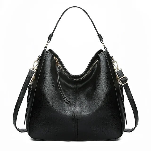 Classic leather shoulder bag with sleek gold details