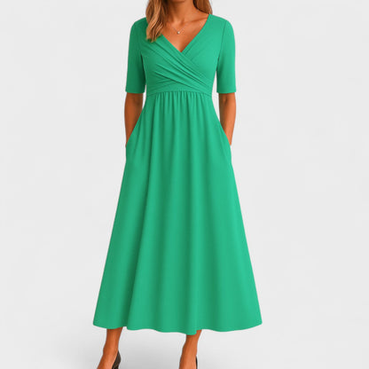 Abito midi elegante con scollo a V e vestibilità valorizzante da donna