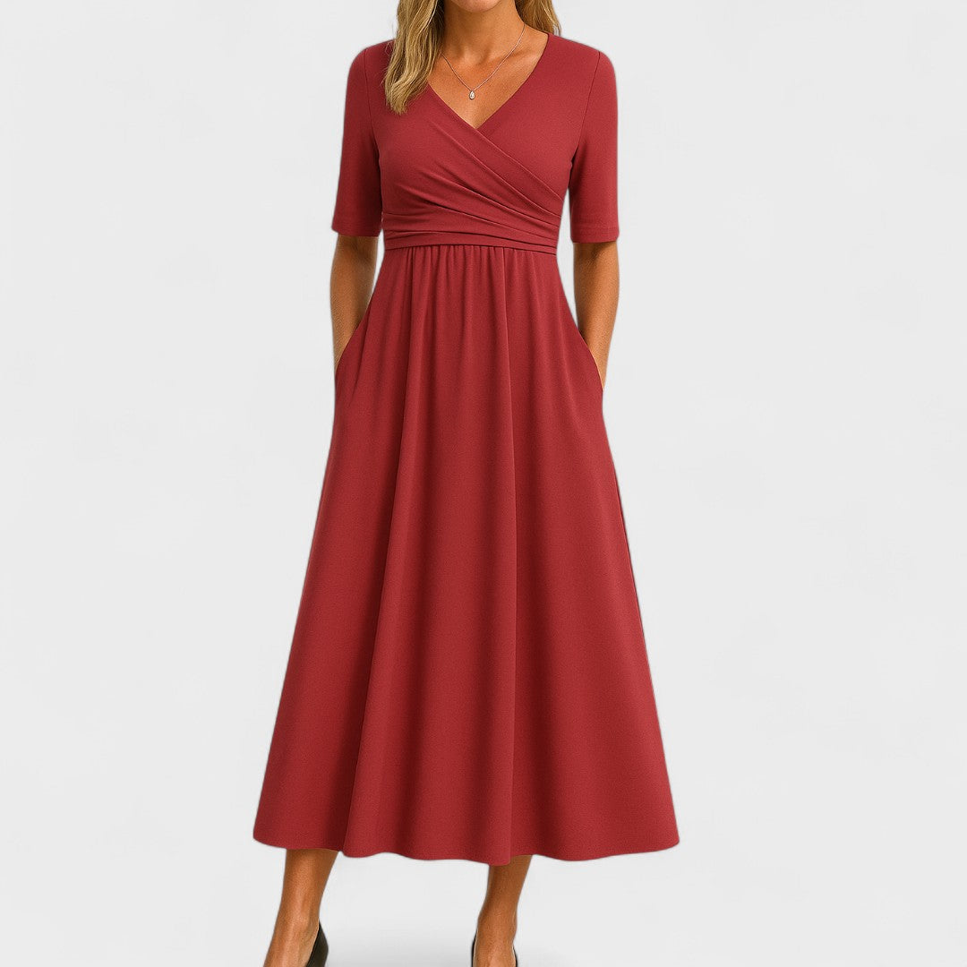 Abito midi elegante con scollo a V e vestibilità valorizzante da donna