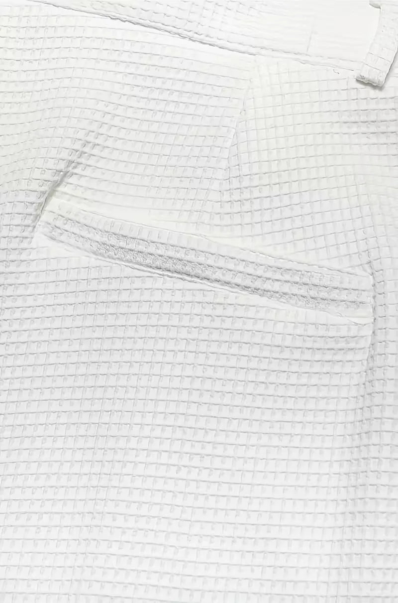 Lightweight fabric trousers with straight legs and side pockets