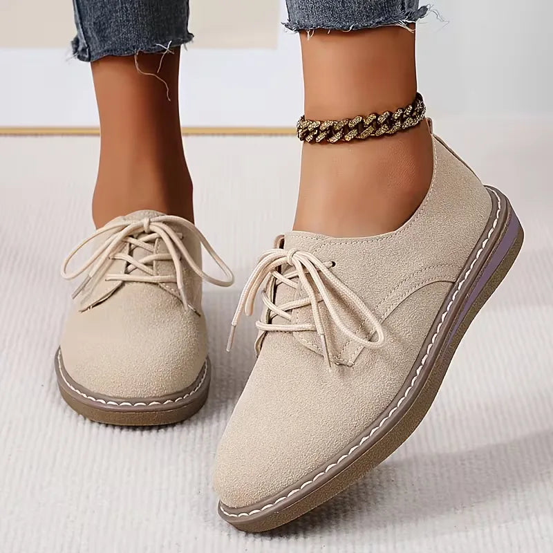 Loafers with brogue and laces