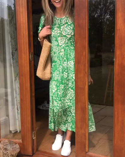 Long dress with short sleeves and a floral print