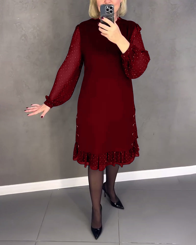 Long-sleeved elegant dress with polka dots