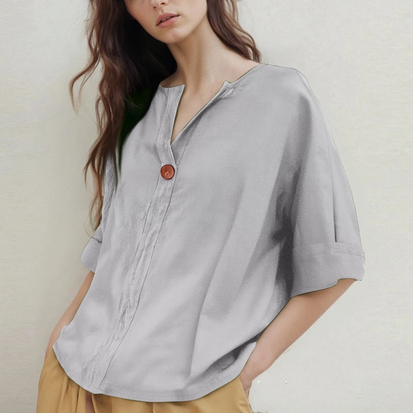 Loose-Fitting V-Neck Blouse with Three-Quarter Sleeves