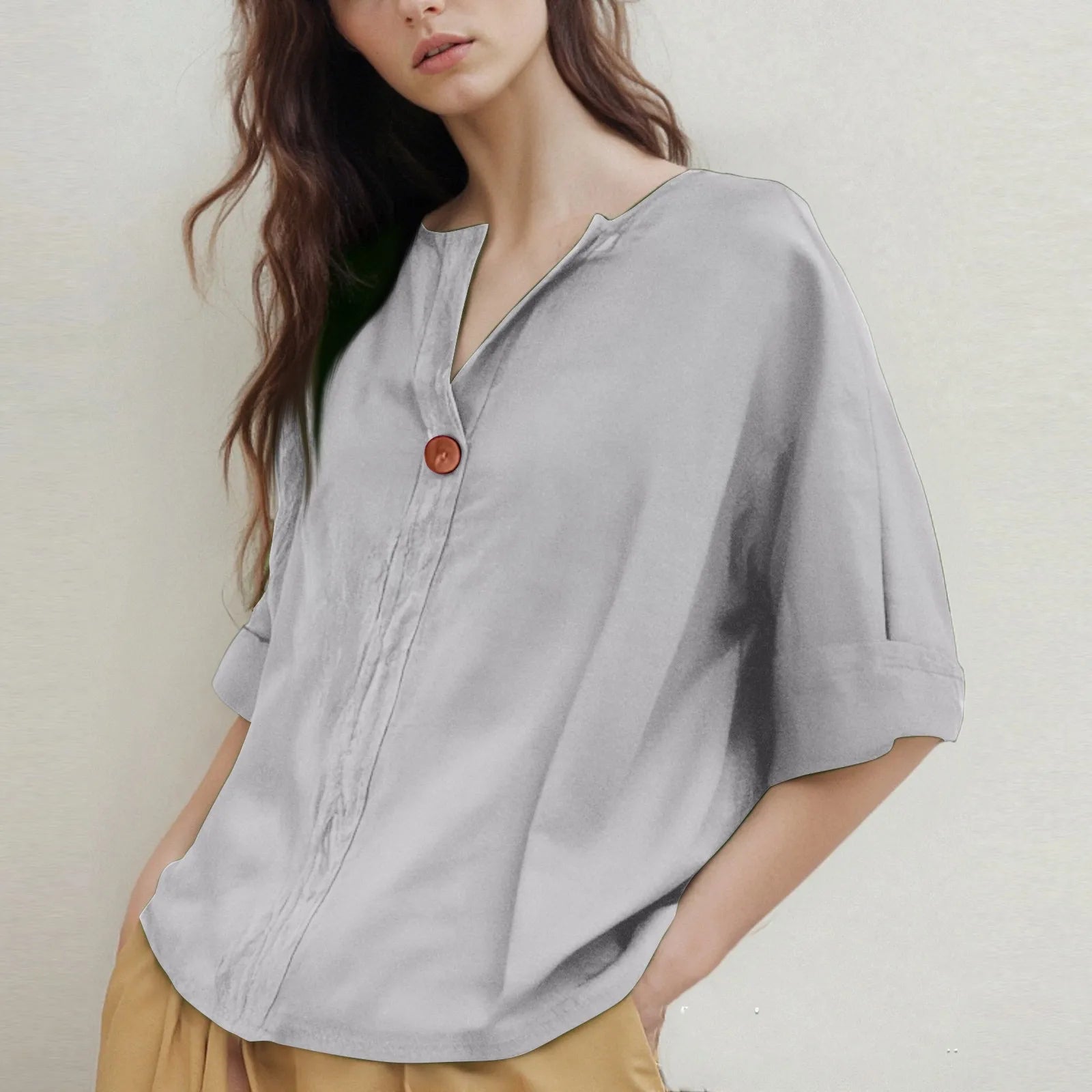 Loose-Fitting V-Neck Blouse with Three-Quarter Sleeves