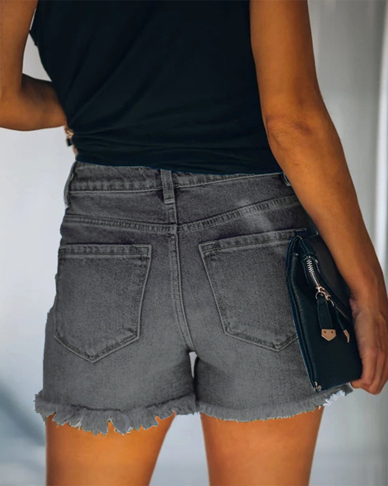 Mid-rise ripped denim shorts