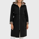 Impermeable largo entallado para mujer con capucha y cremallera