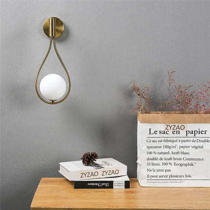 Moderne led-wandlamp van glas en metaal