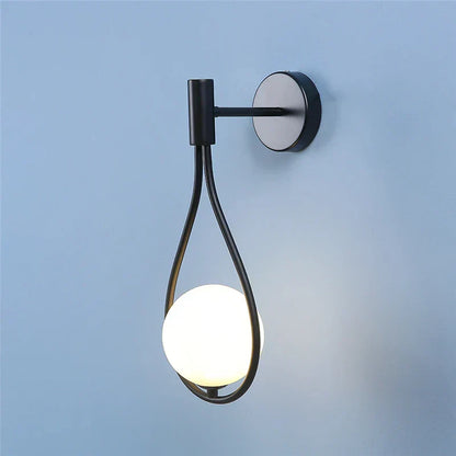 Moderne led-wandlamp van glas en metaal
