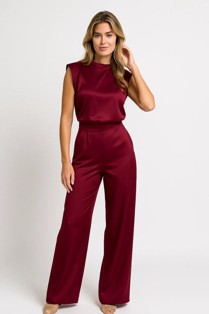 Combinaison sans manches avec un aspect satin luxueux et des jambes larges