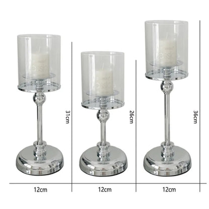 Elegante portacandela in metallo con bicchiere in vetro, per una decorazione d'atmosfera
