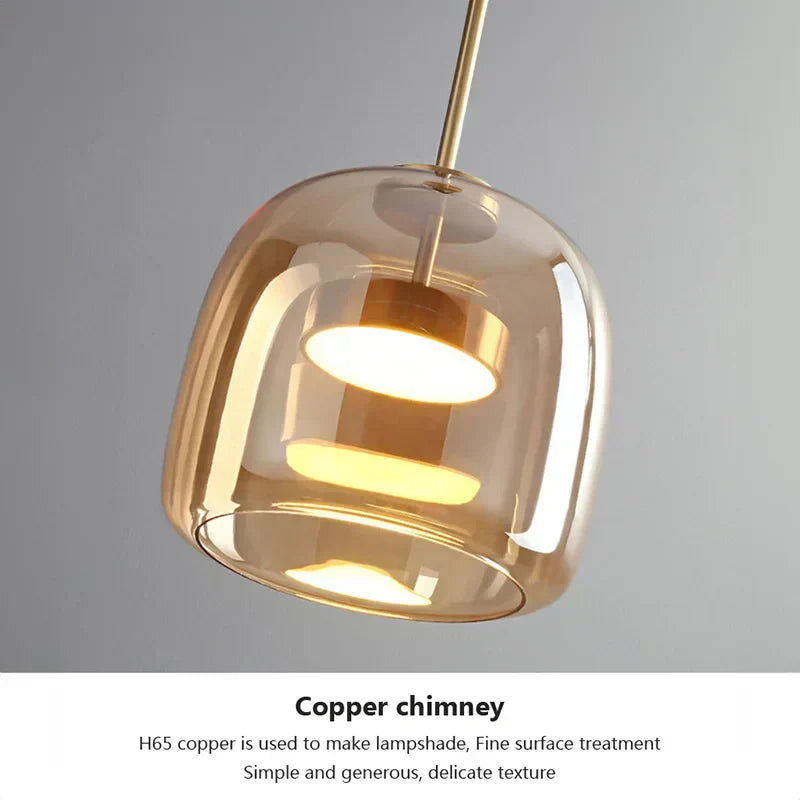Minimalistisk pendellampe i glass - gjennomsiktig lys