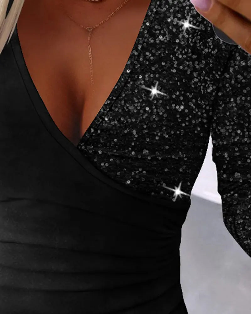 Overlaptop with contrasting sequins and ruffles
