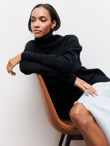 Oversized jumper with high collar and ribbed finish