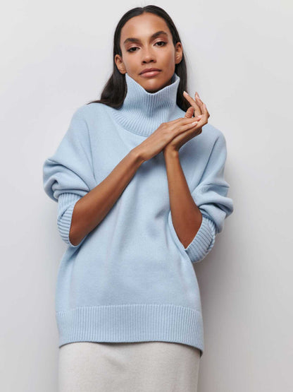 Oversized jumper with high collar and ribbed finish