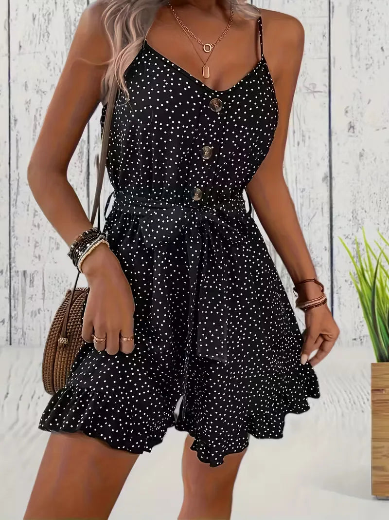 Playsuit with polka dots and V-neck