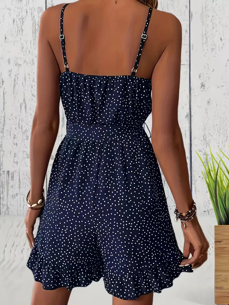 Playsuit with polka dots and V-neck