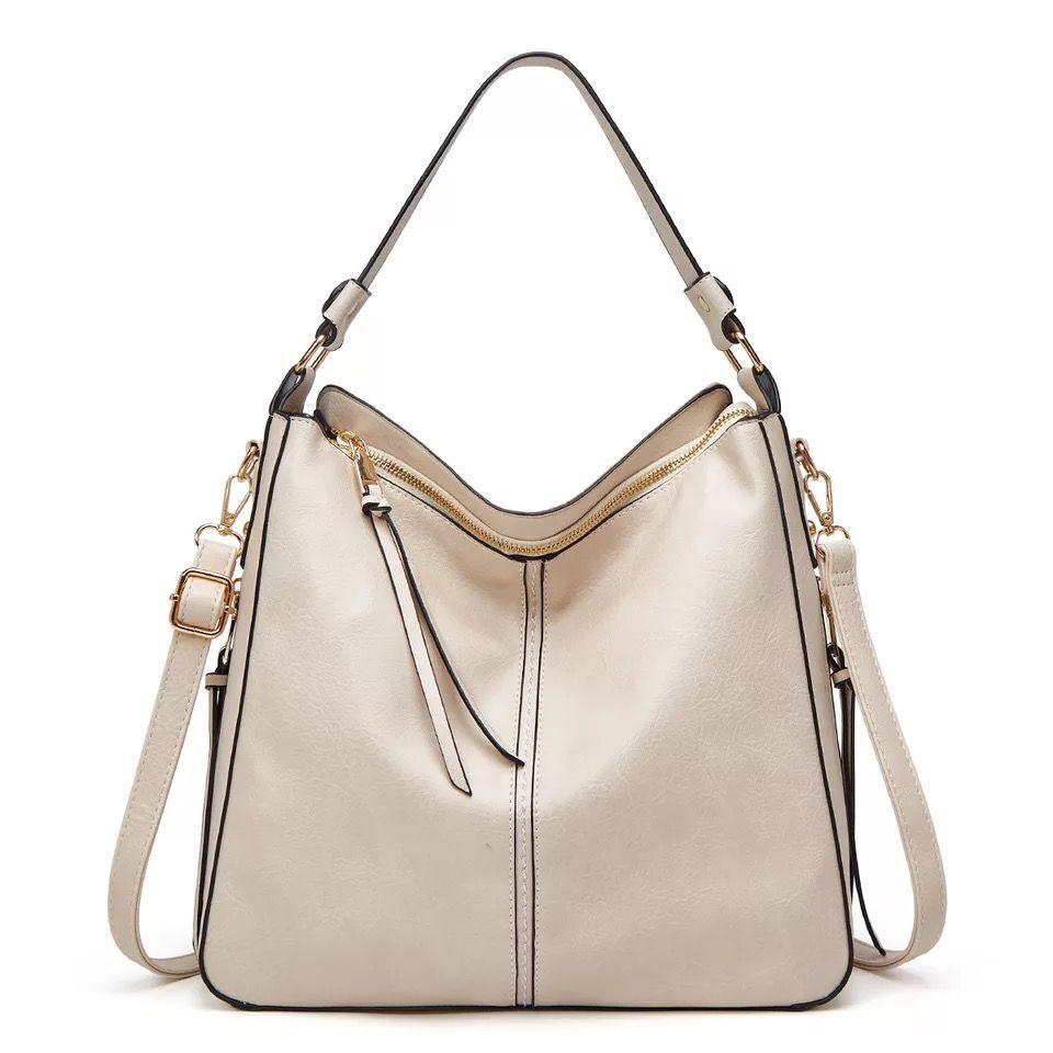 Classic leather shoulder bag with sleek gold details