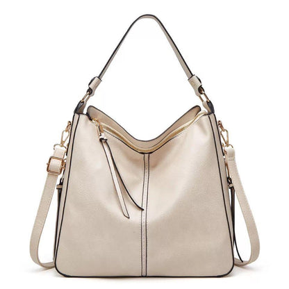 Classic leather shoulder bag with sleek gold details